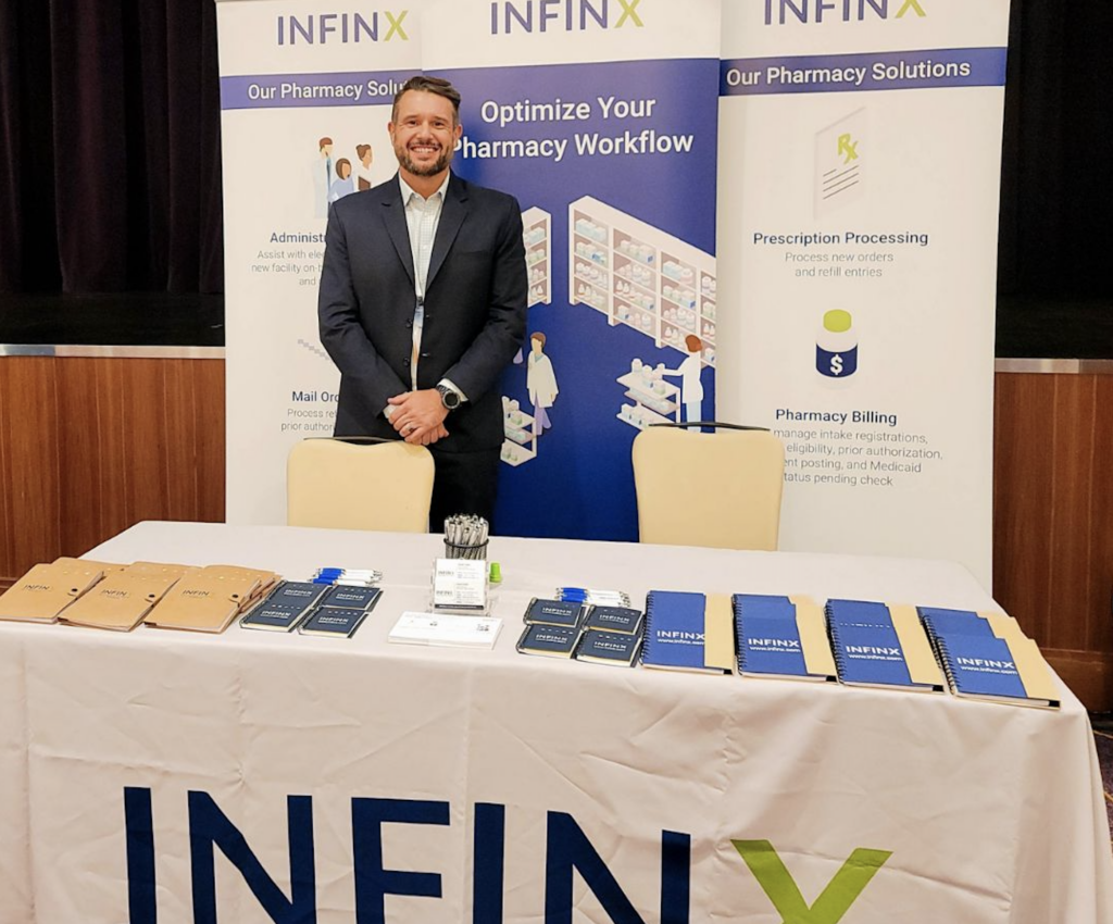 Infinx - Tradeshow Event - Infinx Booth With Derek Taylor PharmD