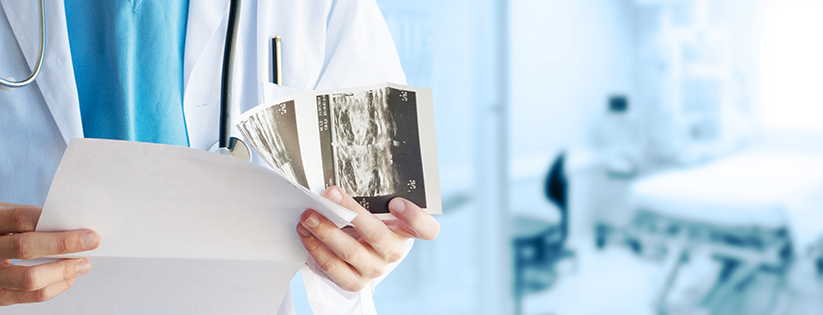 doctor with patient xrays